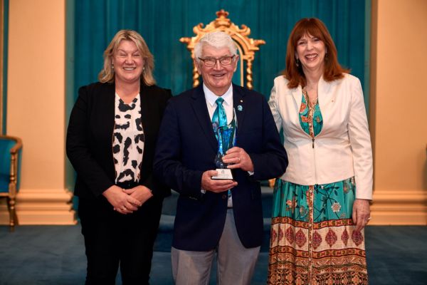 Andrew Suggett OAM with the Governor of Victoria and Minister Stitt.