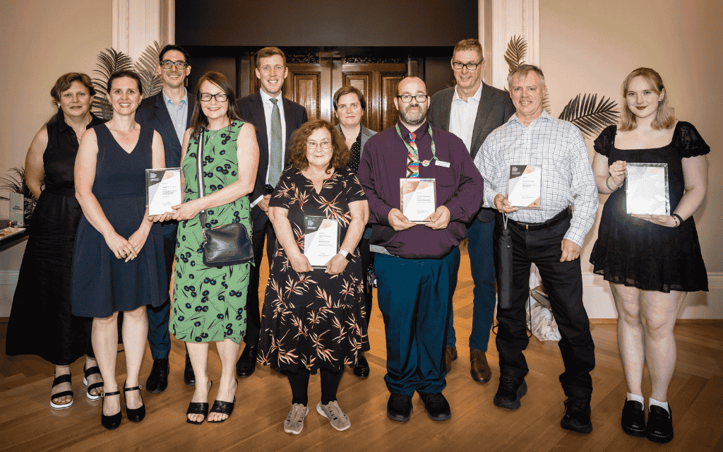 Victorian Disability Awards 2024 winners holding their awards.