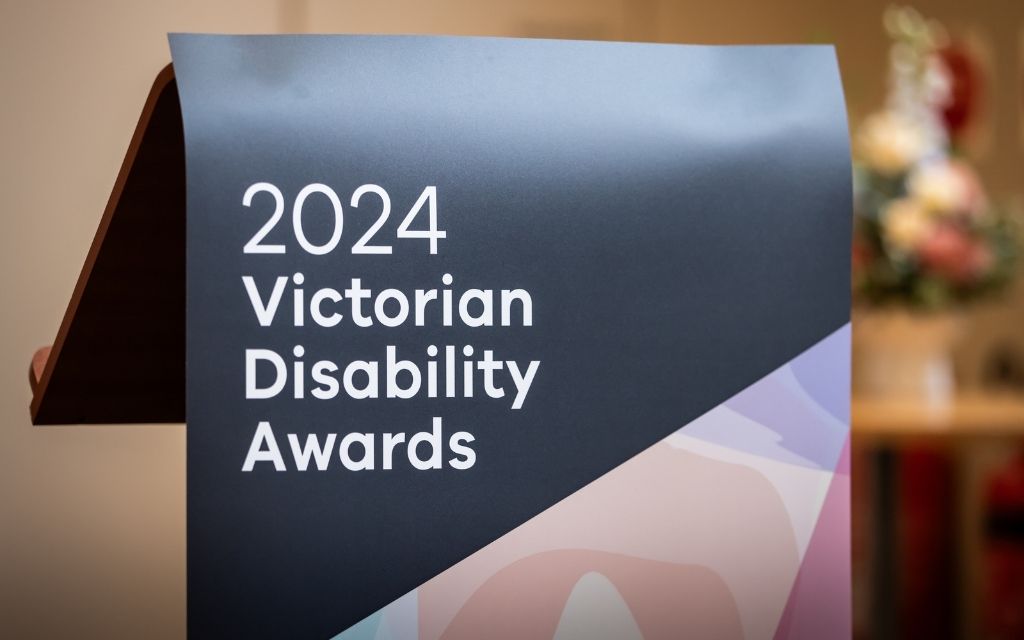 A podium with a sign that says 2024 Victorian Disability Awards.