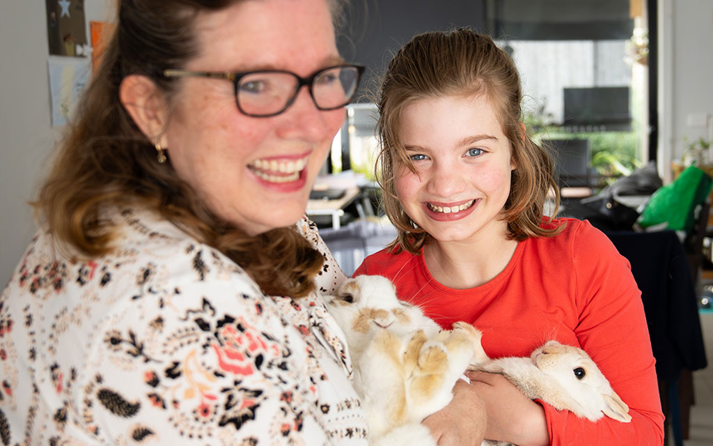 Sara and Leanna with their rabbits, Runner and Ronald 