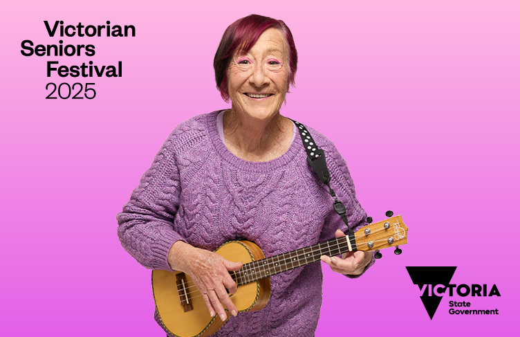 A woman playing a ukulele